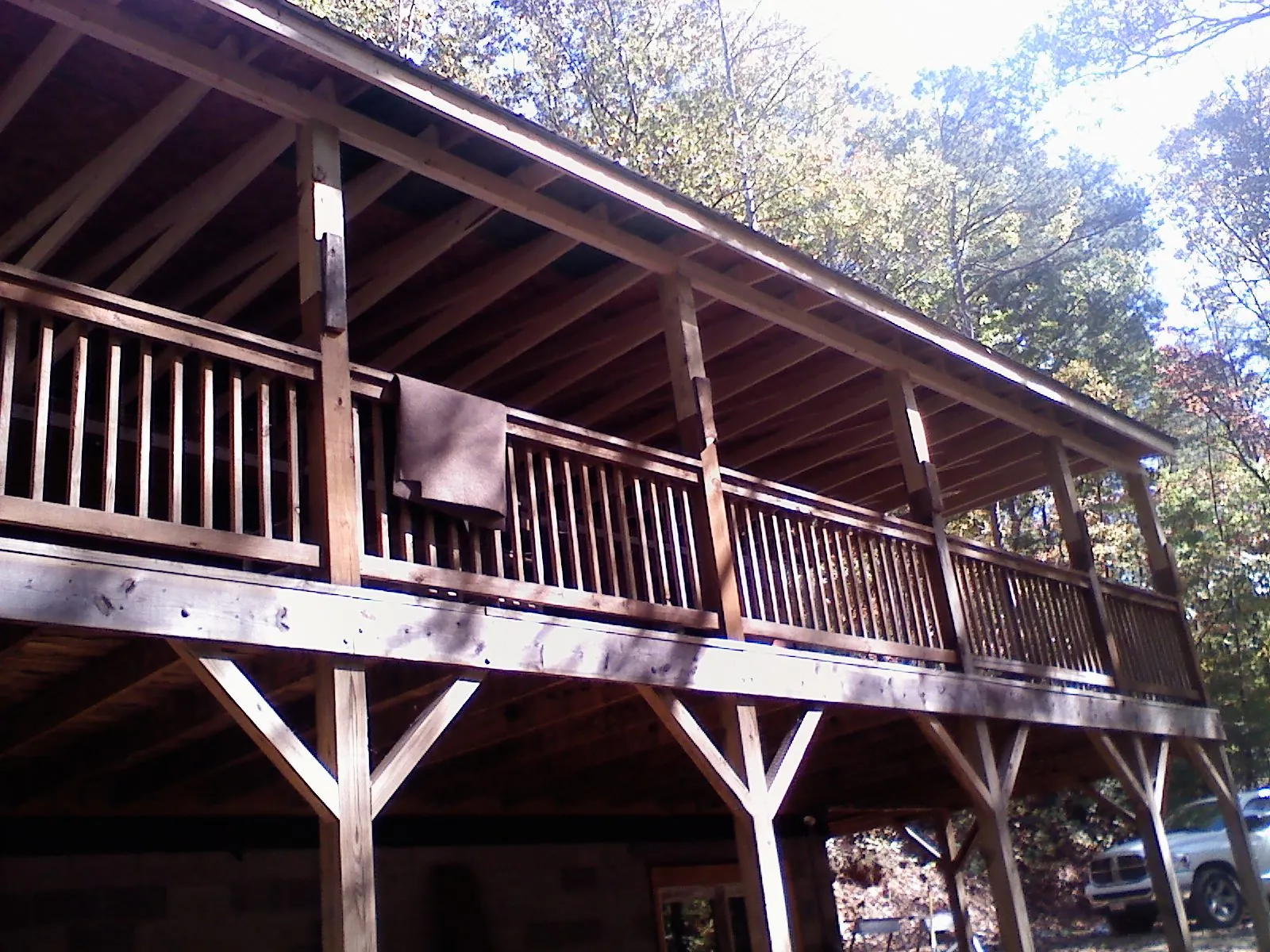 Timber framing under a new elevated porch and deck — Roof Leak Repair in Alloy by Roofing Brothers